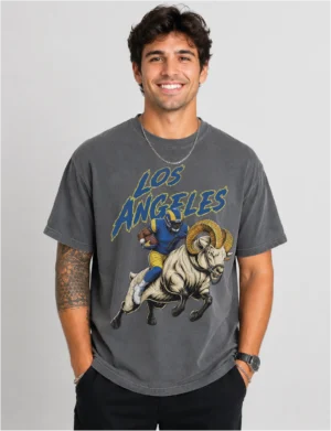 Los Angeles Rams Football Shirt featuring a bold vintage-style football player and ram illustration printed on a soft black Comfort Colors tee. A great game day, tailgate, or gift shirt for Los Angeles Rams fans.