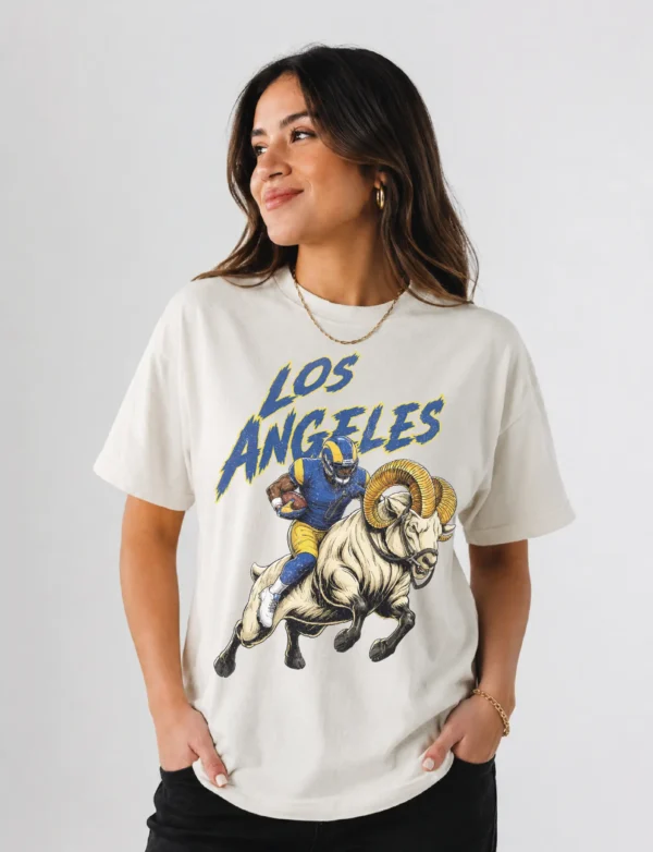 Los Angeles Football Football Shirt featuring a bold vintage-style football player and ram illustration printed on a soft black Comfort Colors tee. A great game day, tailgate, or gift shirt for Los Angeles Football fans. Los Angeles Football Football Shirt featuring a bold vintage-style football player and ram illustration printed on a soft black Comfort Colors tee. A great game day, tailgate, or gift shirt for Los Angeles Football fans.